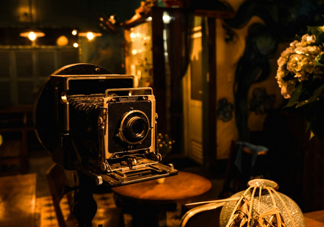 Retro television studio with vintage cameras and warm stage lighting